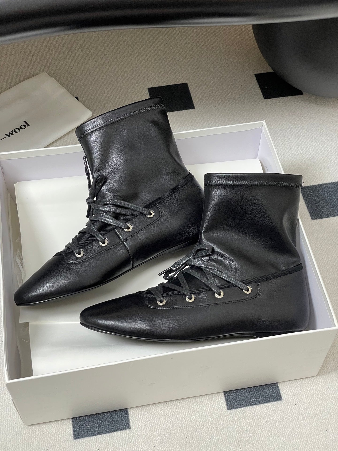 ALO 25S PALOMA WOOL FLAT ANKLE BOOTS IN BLACK LAMBSKIN