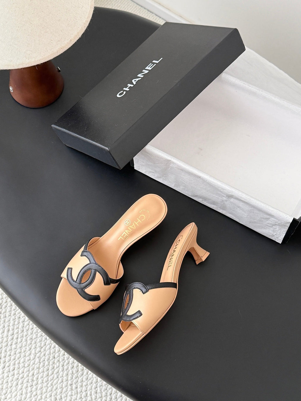 CHANEL MULES IN BEIGE AND BLACK CALFSKIN