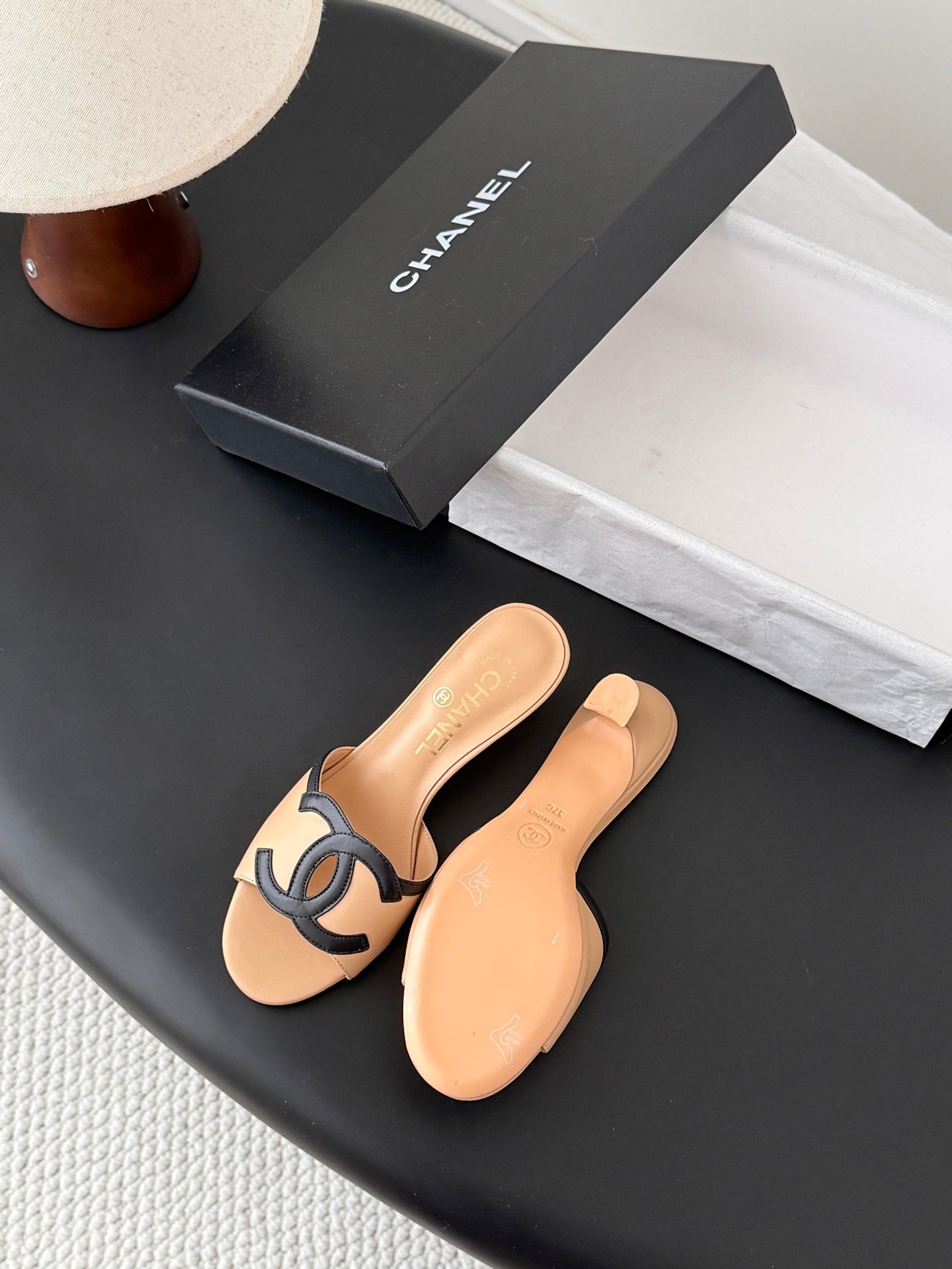 CHANEL MULES IN BEIGE AND BLACK CALFSKIN