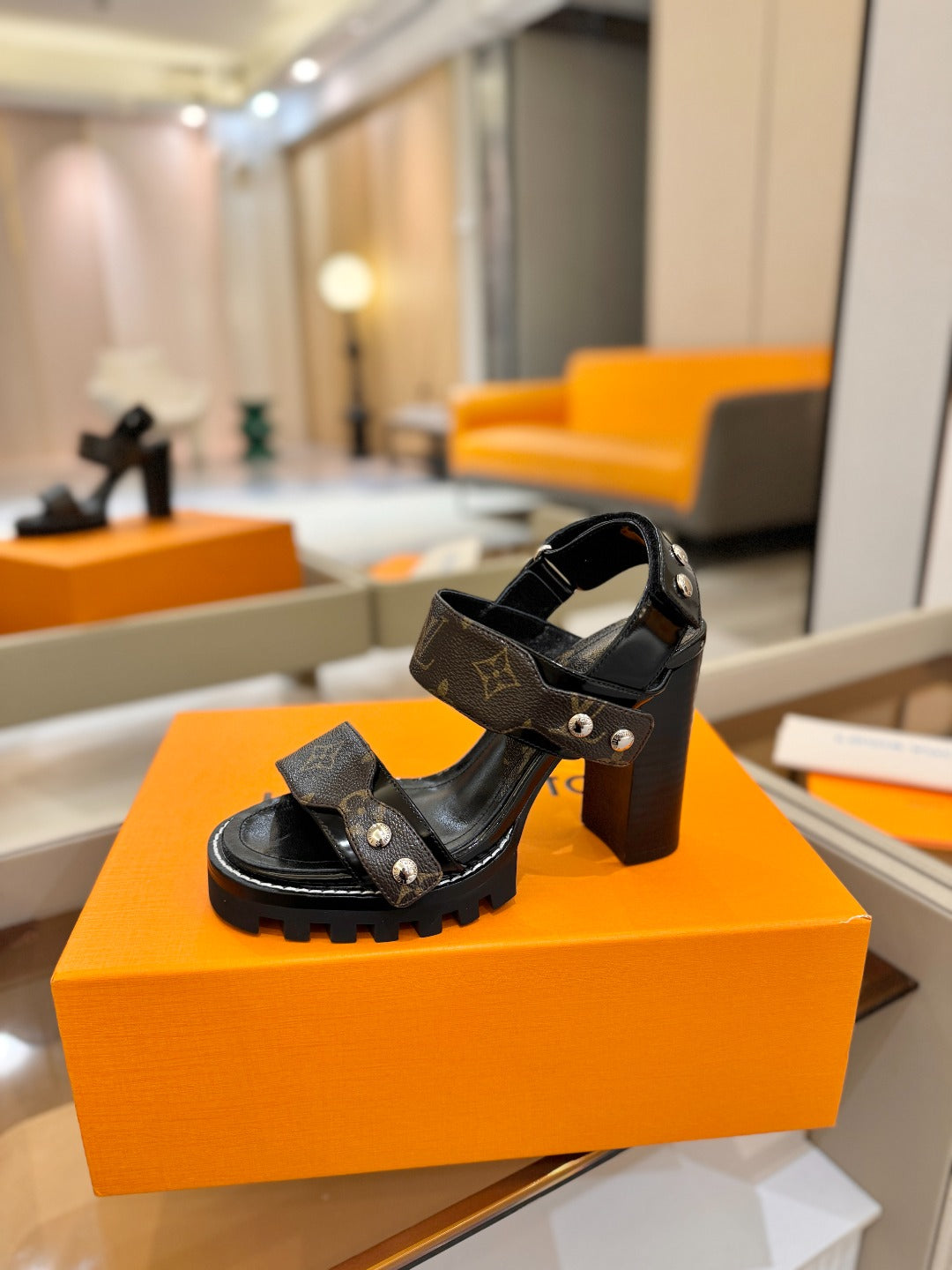 LV 26S HIGH HEEL SANDALS 100 MM IN DARK BROWN AND BLACK CALFSKIN