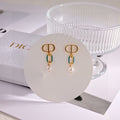 CD 26S LOGO ENAMEL LINK PEARL DROP EARRINGS IN GOLD METAL