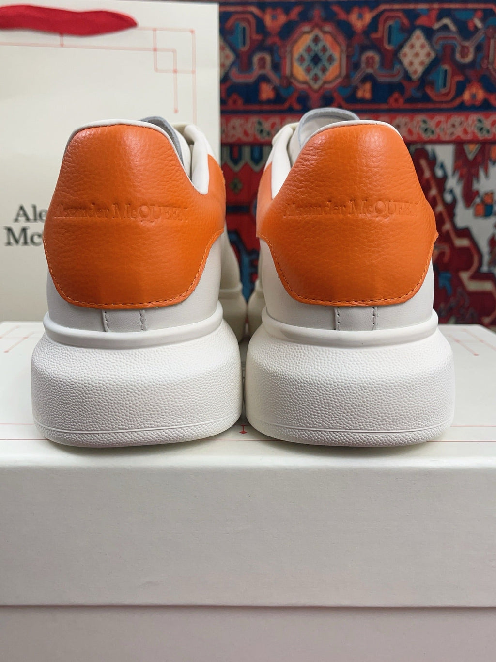 OVERSIZED SNEAKER IN WHITE CALFSKIN ORANGE HEEL TAB EMBOSSED LOGO