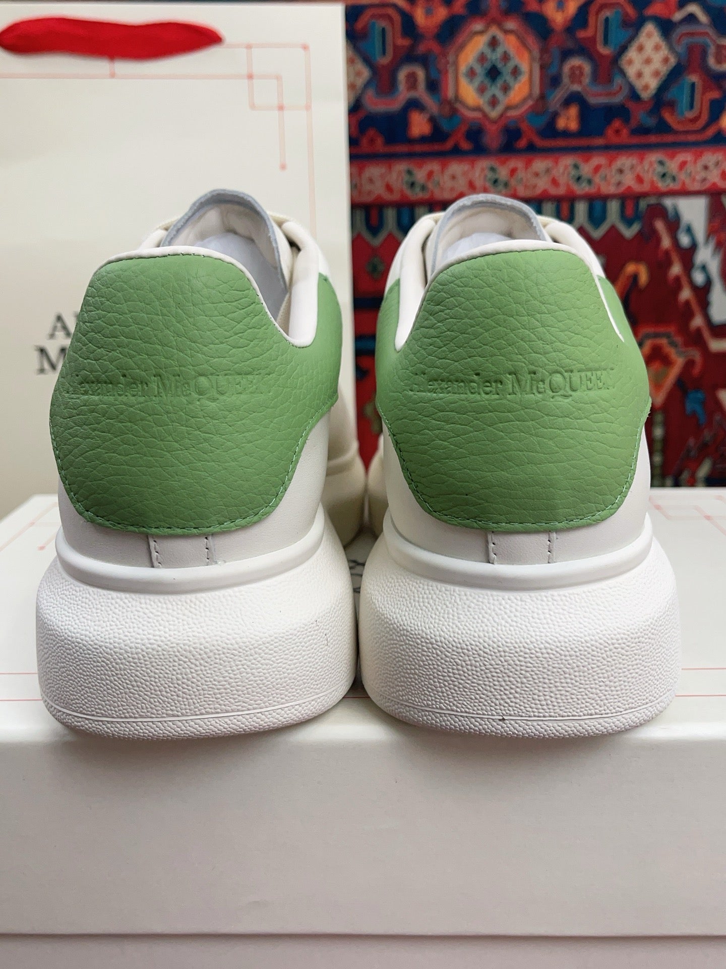 OVERSIZED SNEAKER IN WHITE CALFSKIN WITH EMBOSSED HUNTER GREEN HEEL TAB