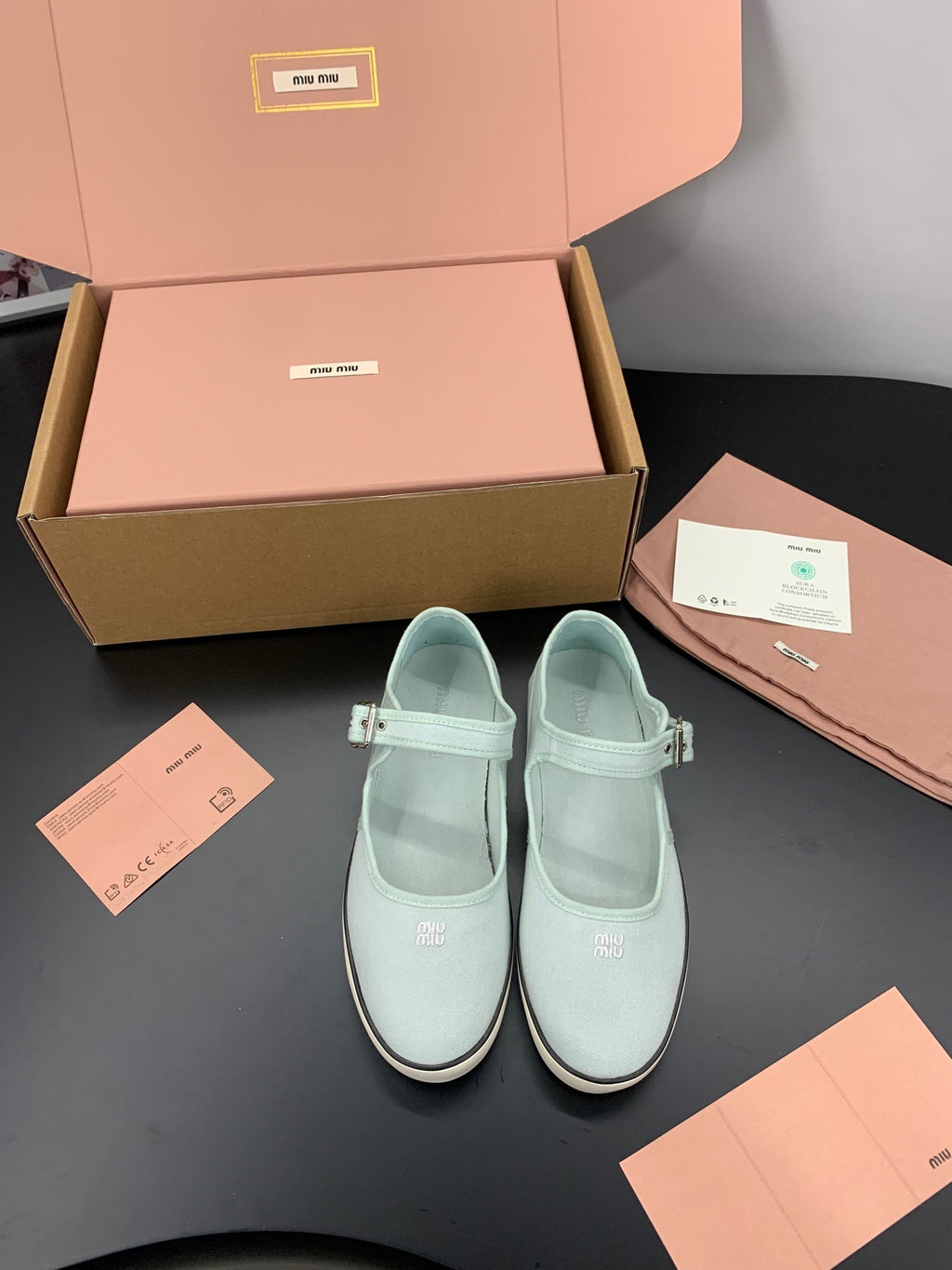 MIUMIU 26S MARY JANE FLATS IN PALE MINT CANVAS LOGO