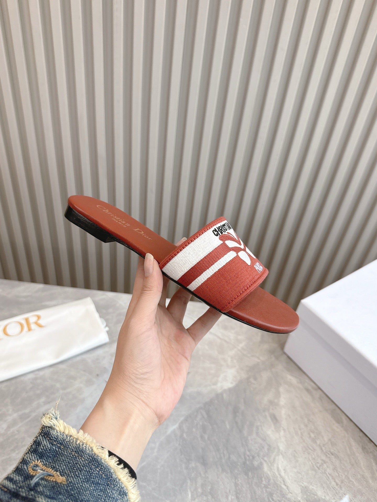 DIOR FLAT SLIDES 25S IN DARK ORANGE CALFSKIN AND FABRIC BRAND NAME EMBROIDERY