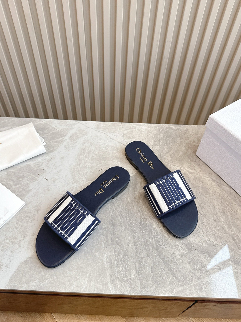 DIOR FLAT SLIDES 25S IN MIDNIGHT BLUE CALFSKIN AND FABRIC BRAND NAME EMBROIDERY