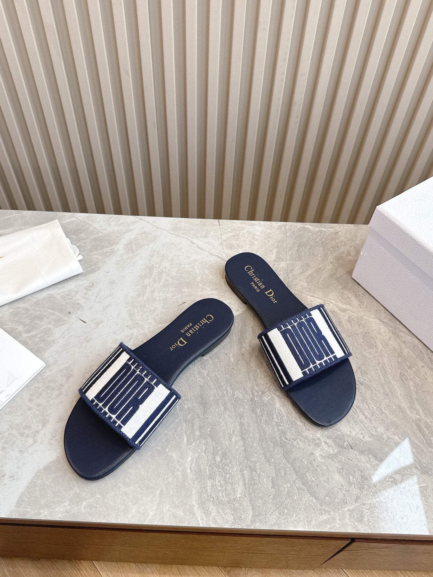 DIOR FLAT SLIDES 25S IN MIDNIGHT BLUE CALFSKIN AND FABRIC BRAND NAME EMBROIDERY