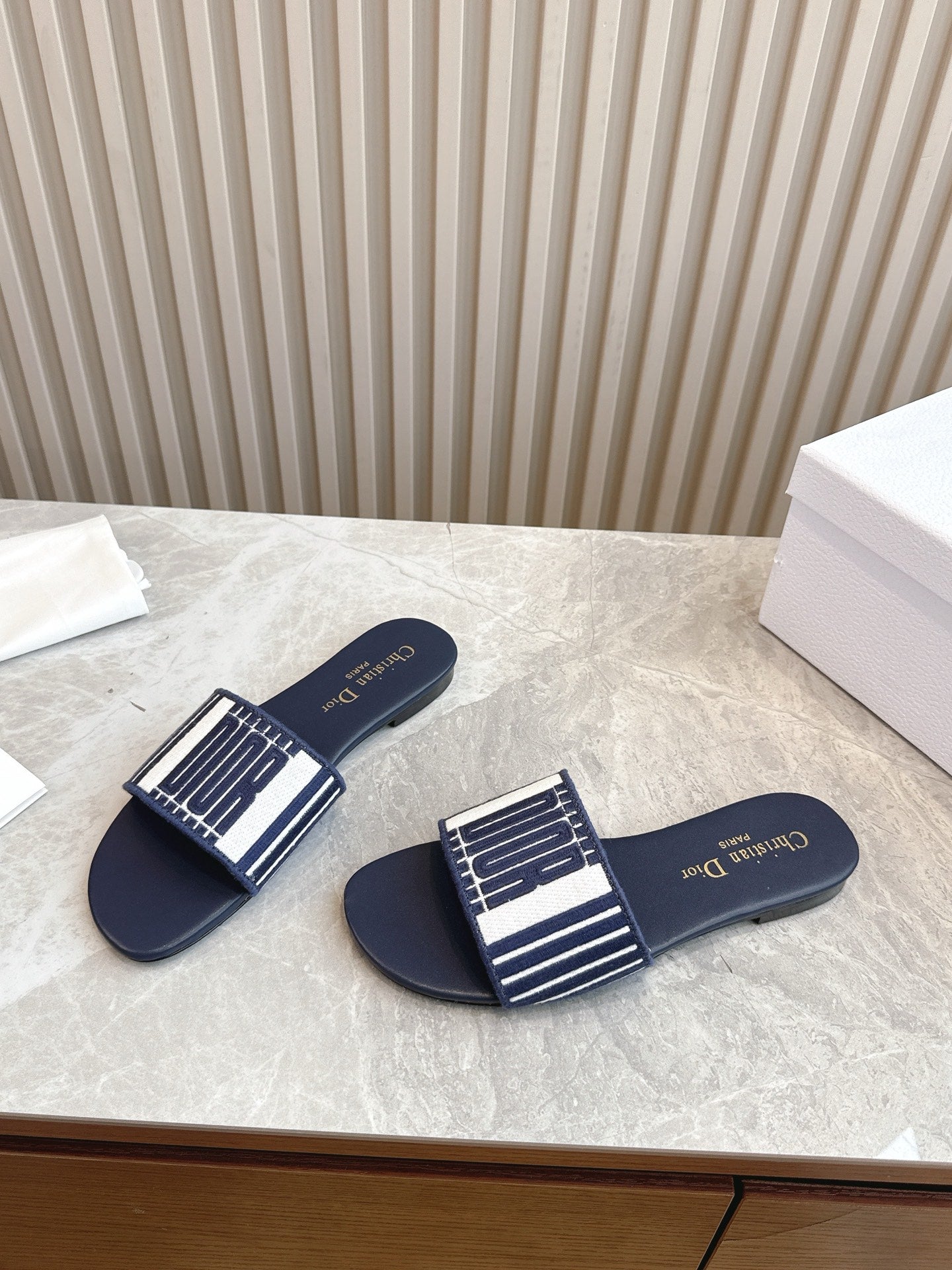 DIOR FLAT SLIDES 25S IN MIDNIGHT BLUE CALFSKIN AND FABRIC BRAND NAME EMBROIDERY