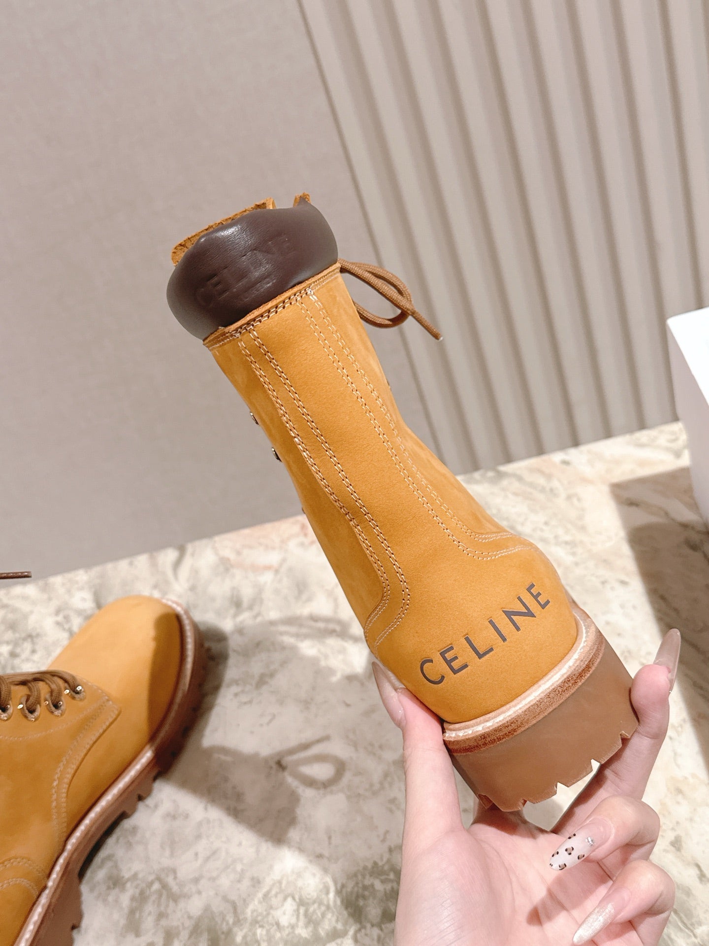 CELINE 25S SHORT MARTIN BOOTS IN MEDIUM ORANGE CALFSKIN