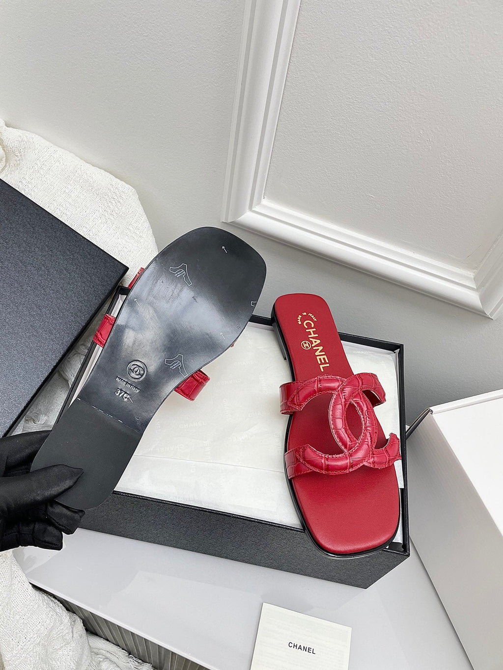 CHANEL CC LOGO MULES IN RED CALFSKIN