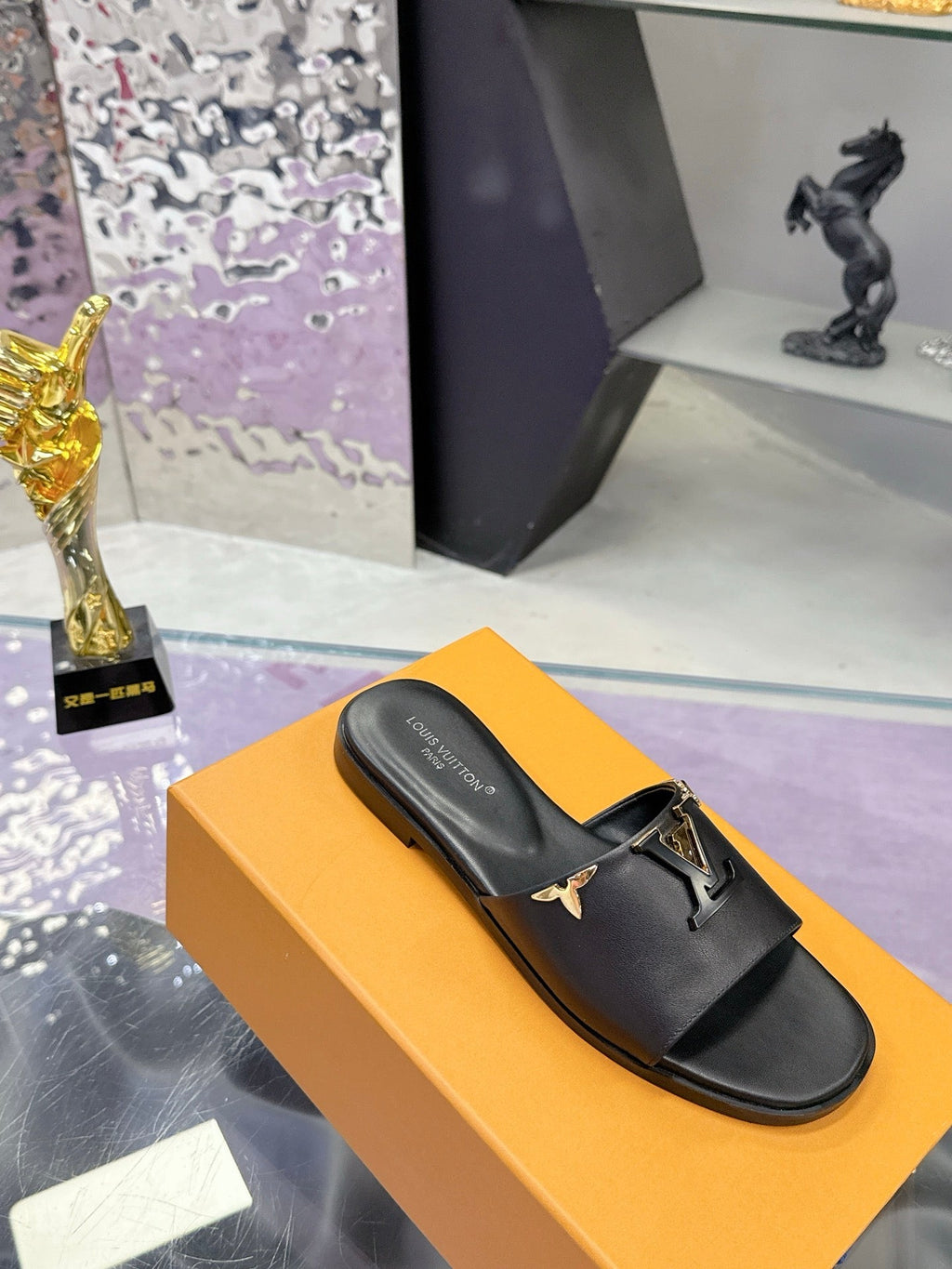 LV 26S FLAT SLIDE SANDALS IN BLACK CALFSKIN GOLD HARDWARE