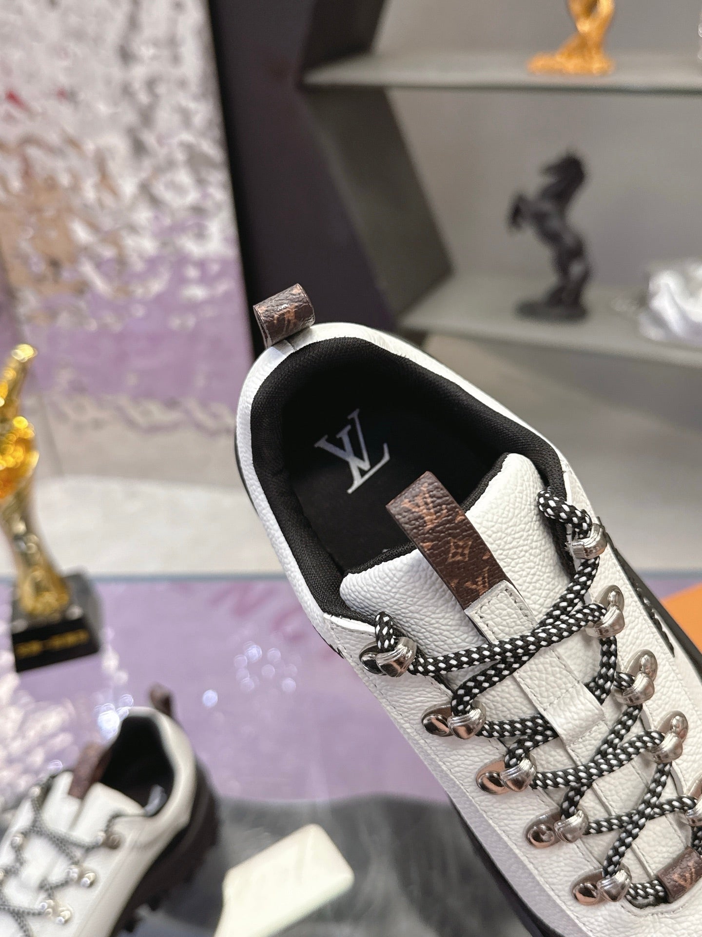 LV 26S RUSH XPLORER SNEAKER IN WHITE BLACK CALFSKIN AND SUEDE