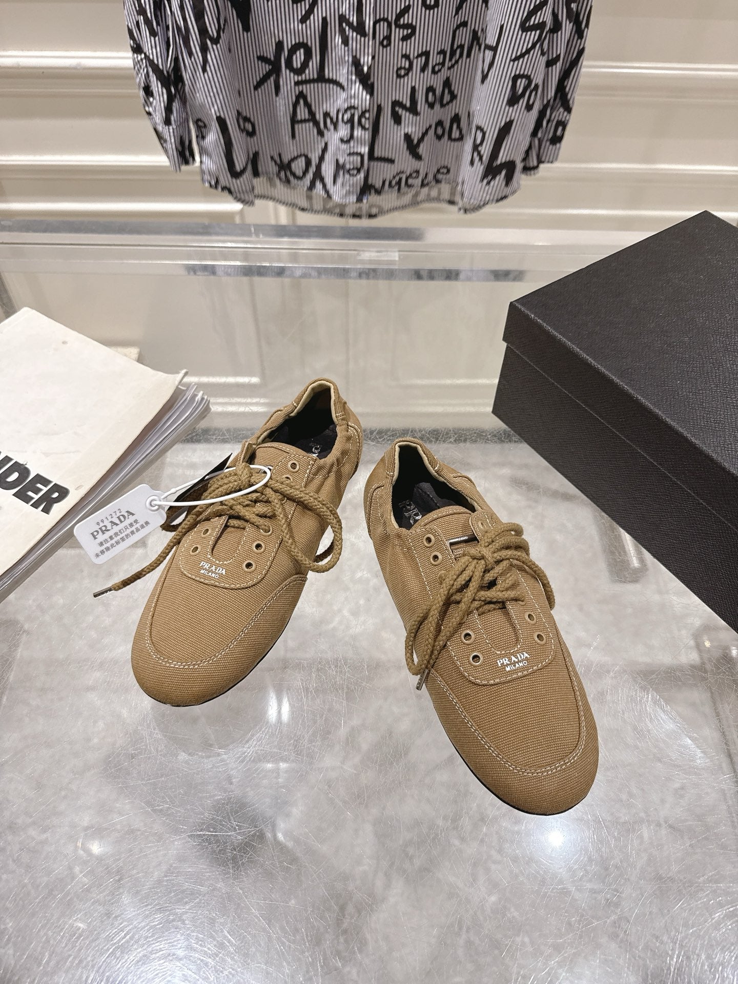 PRADA 26S COLLAPSE SNEAKERS IN BROWN CANVAS