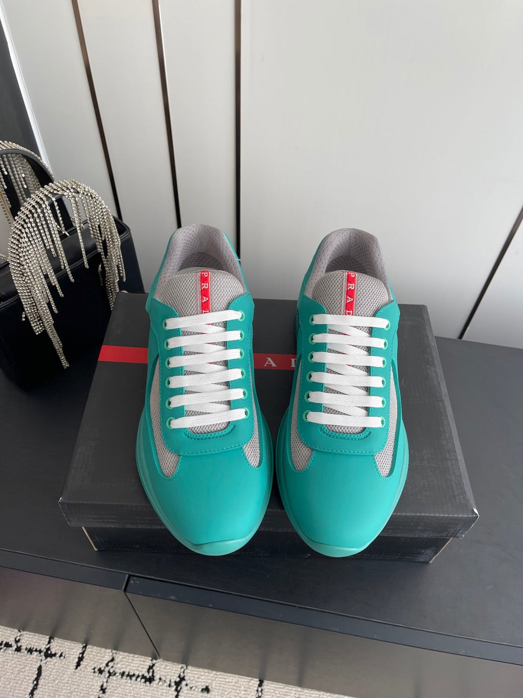 PRADA 26S AMERICA CUP SNEAKERS IN TEAL BLUE SOFT RUBBER AND BIKE FABRIC