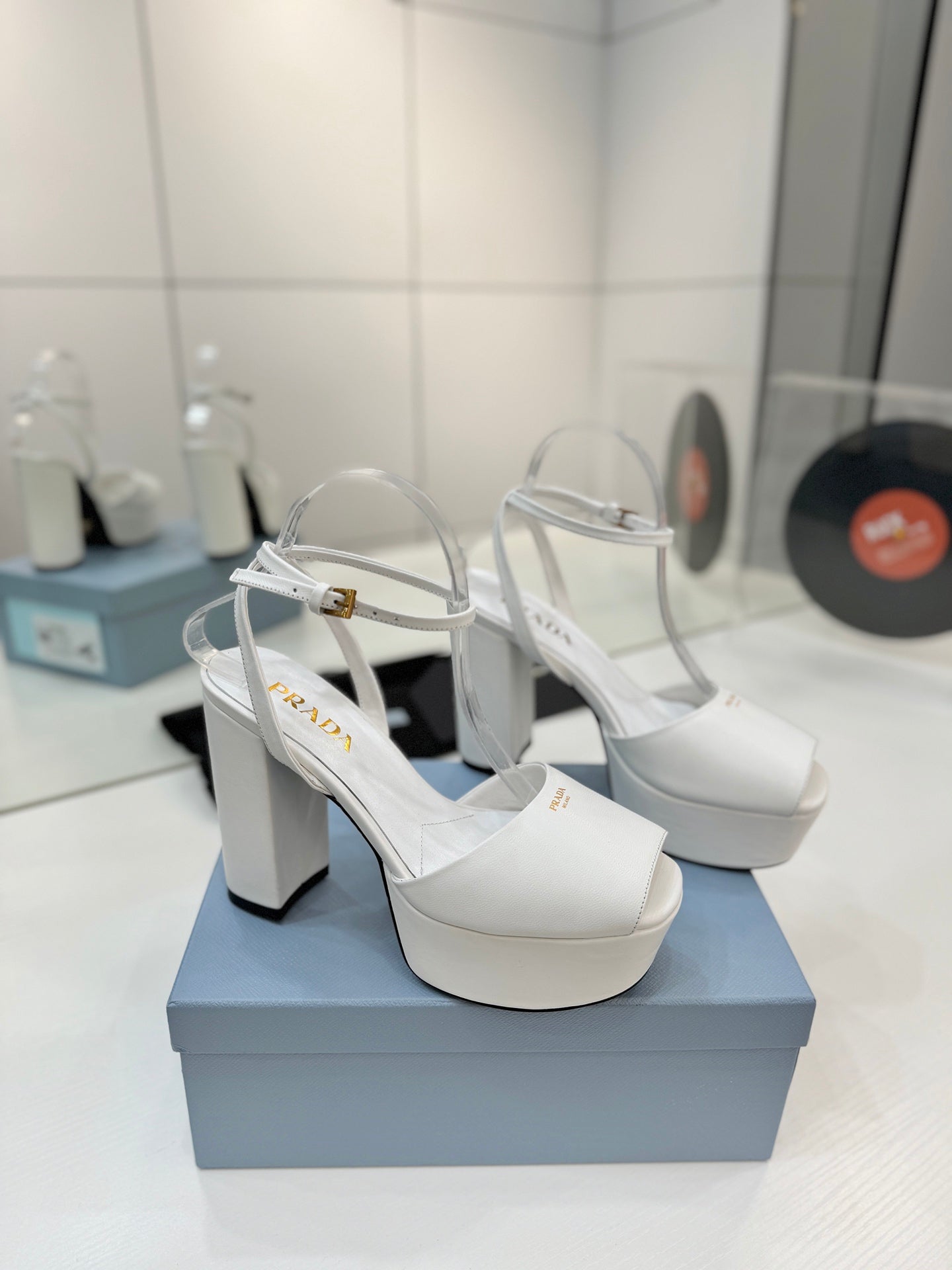 PRADA 26S HEELED SANDALS 115MM IN WHITE CALFSKIN