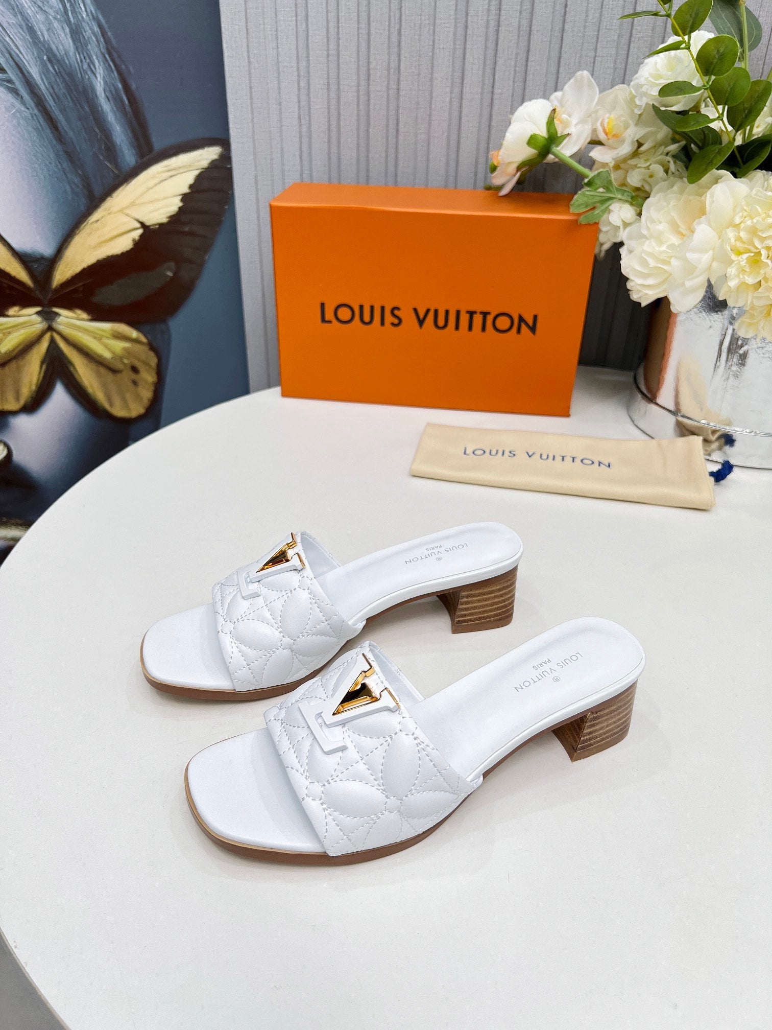 LV 26S MARE HIGH-HEELED MULE SANDALS IN WHITE CALFSKIN