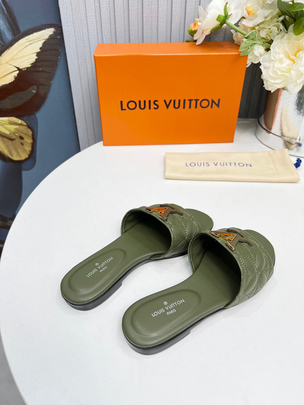 LV 26S MARE FLAT MULES IN MOSS GREEN CALFSKIN