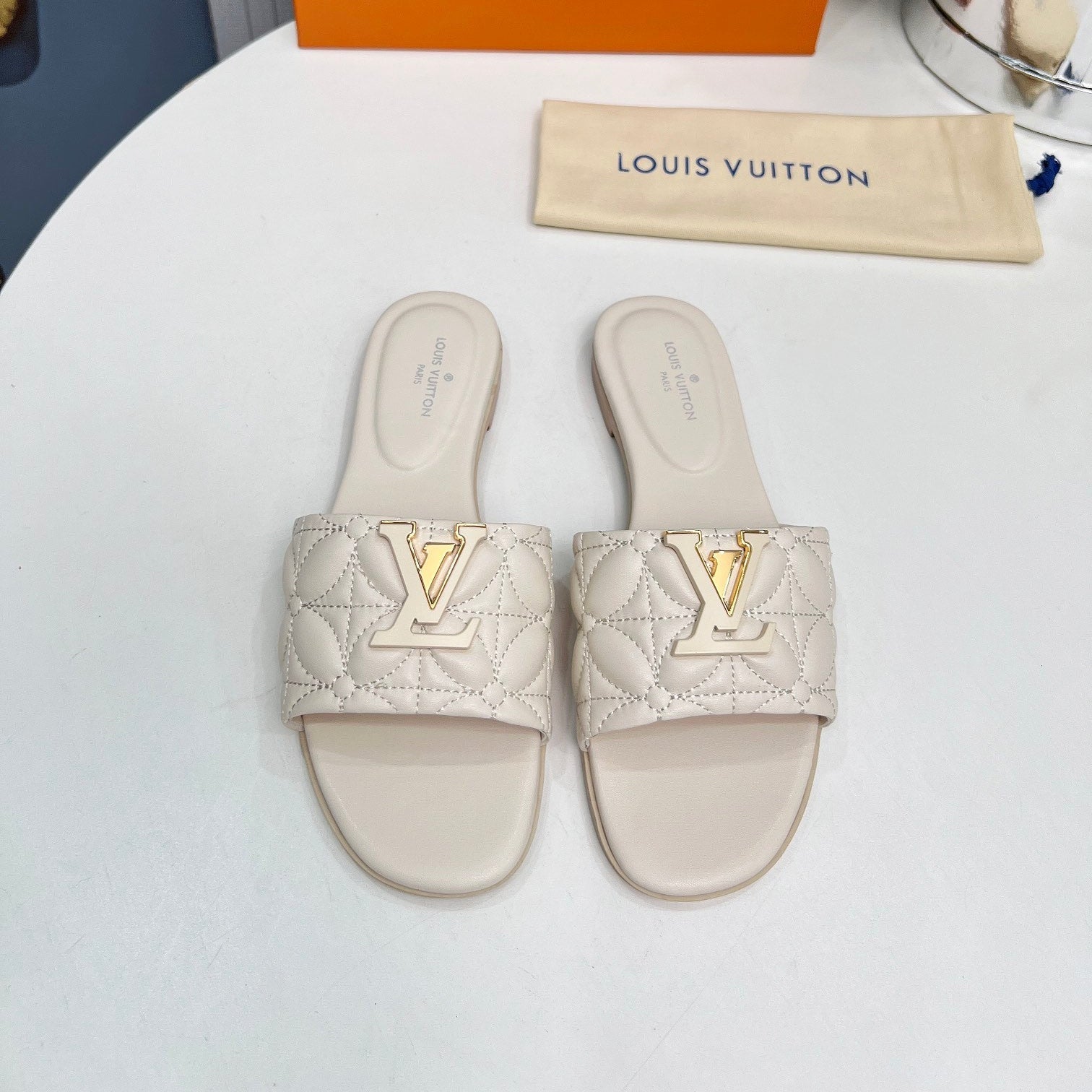 LV 26S MARE FLAT MULES IN IVORY BEIGE CALFSKIN