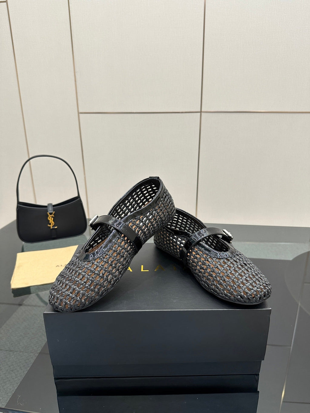 ALAIA MARY JANE FLAT 25S IN BLACK WOVEN MESH