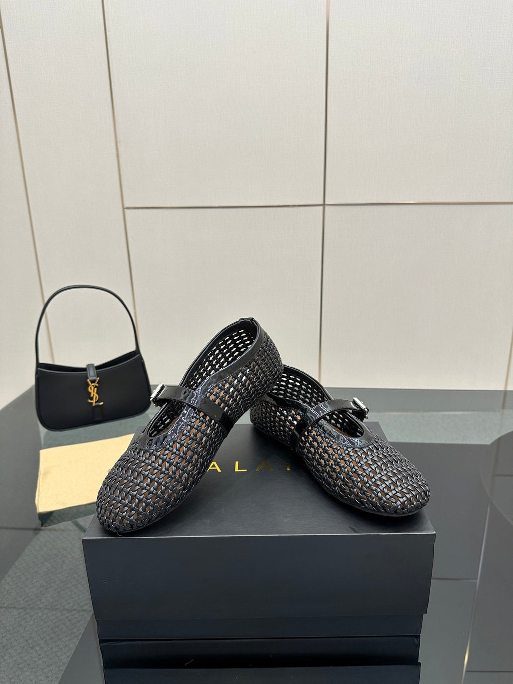 ALAIA MARY JANE FLAT 25S IN BLACK WOVEN MESH