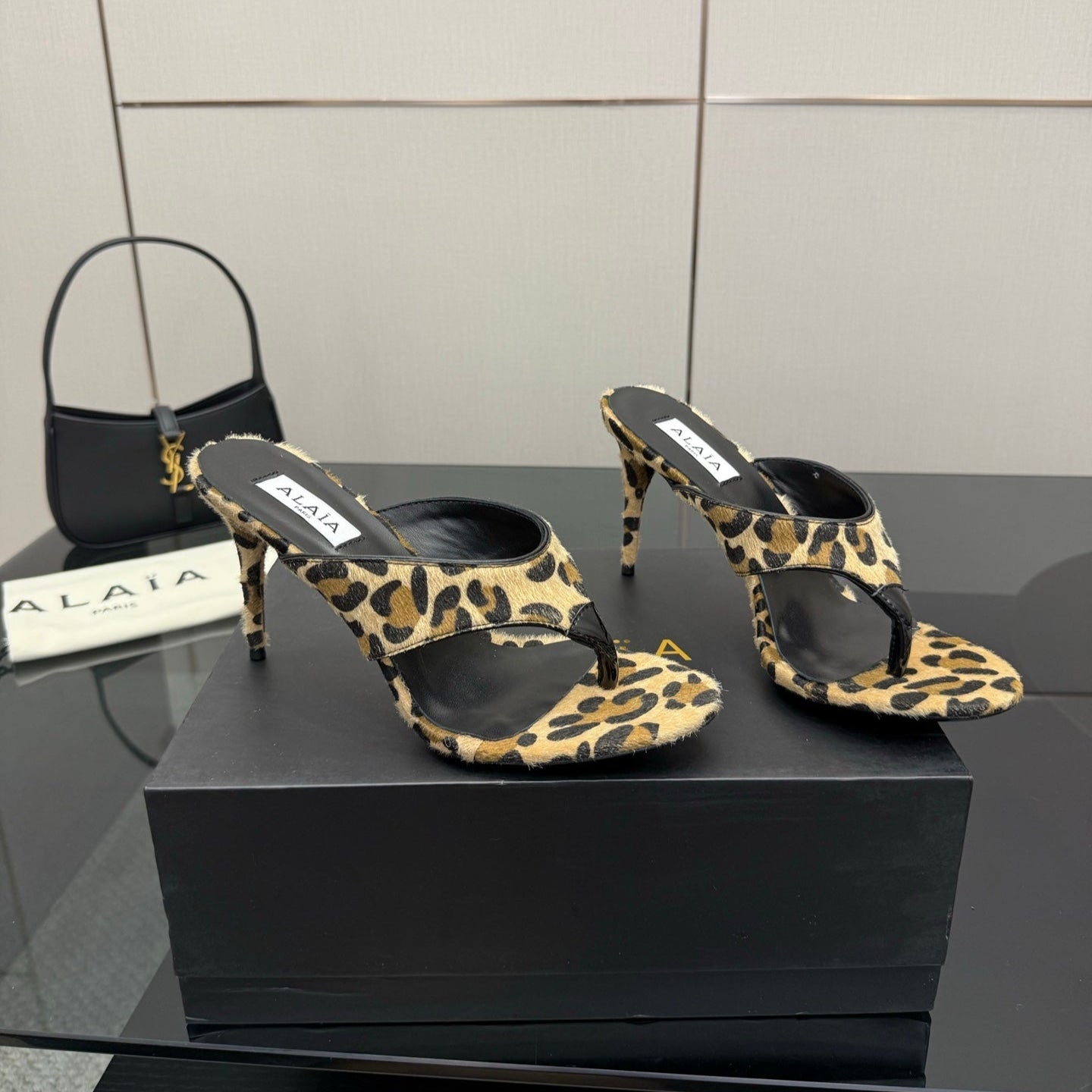 ALAIA HEELED THONG 25S IN LEOPARD PONY HAIR LEATHER