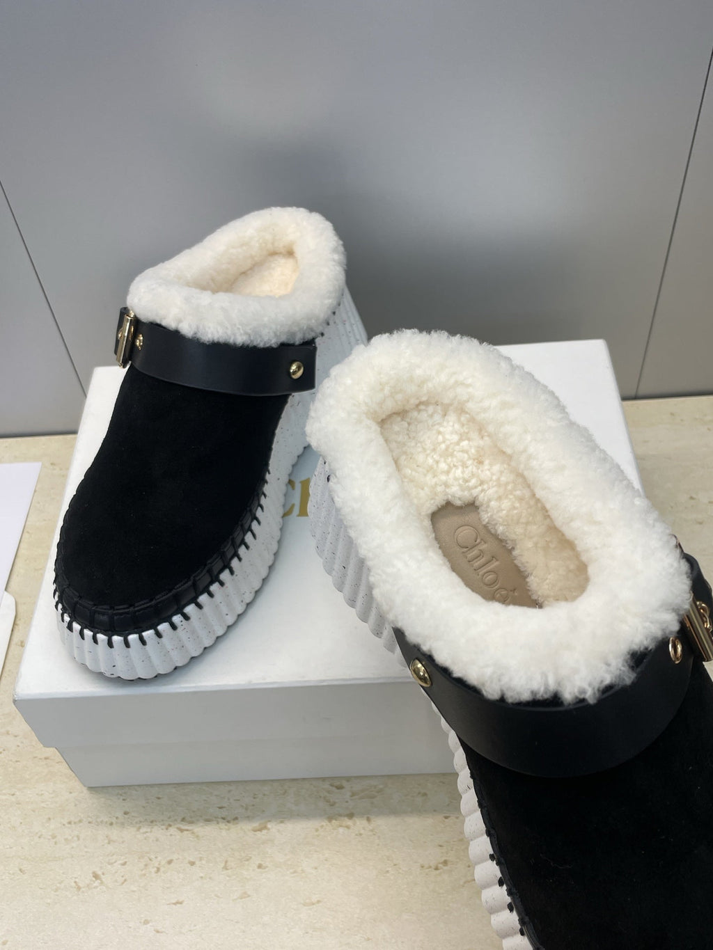 CHLOÉ 26S FUR-LINED WEDGE MULES IN BLACK SUEDE