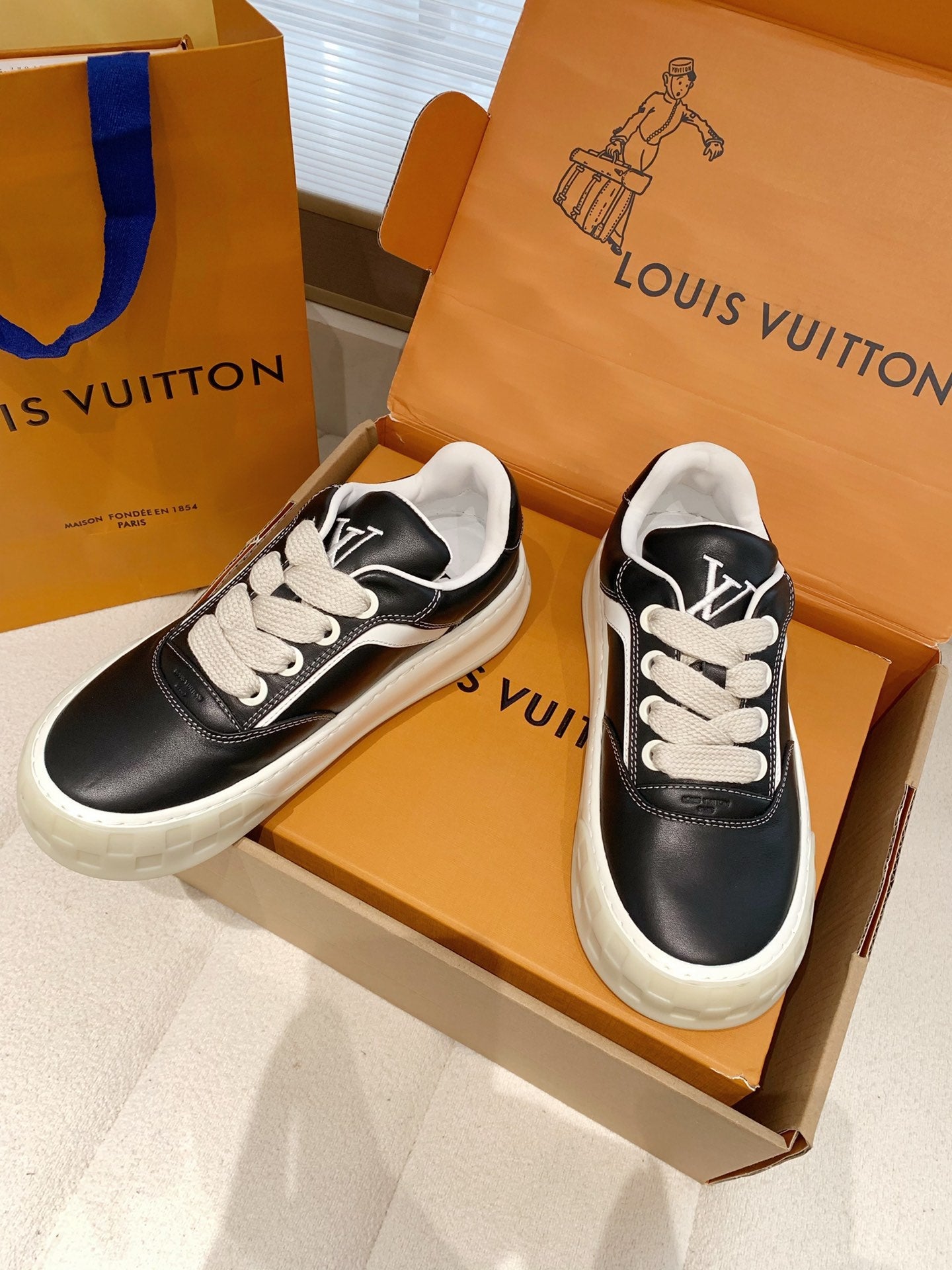 LV 26S TILTED SNEAKERS IN BLACK CALFSKIN