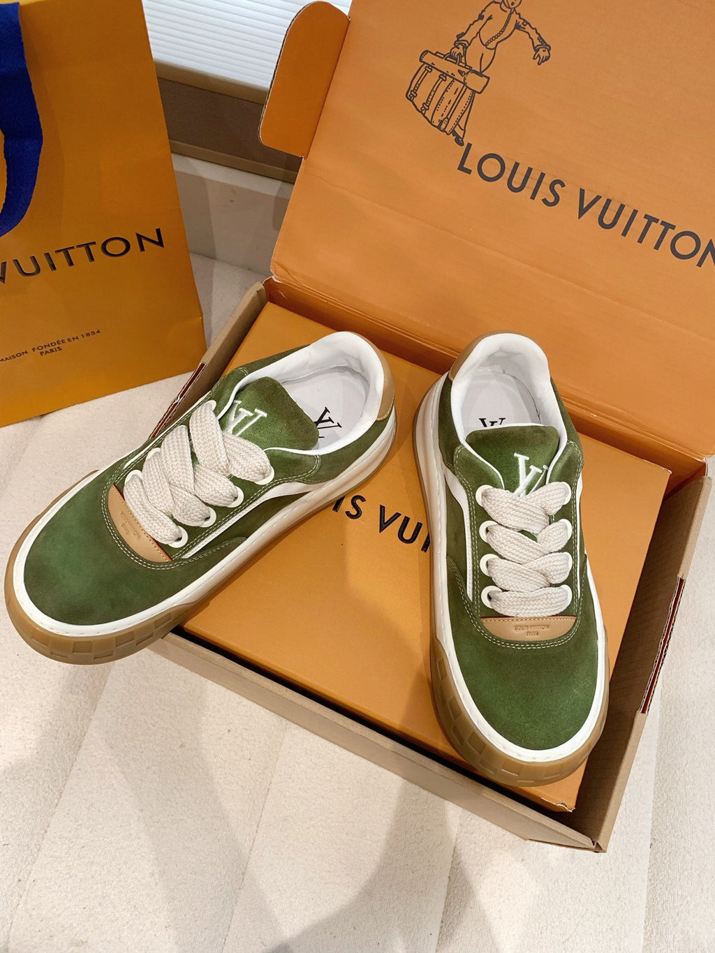 LV 26S TILTED SNEAKERS IN OLIVE GREEN SUEDE