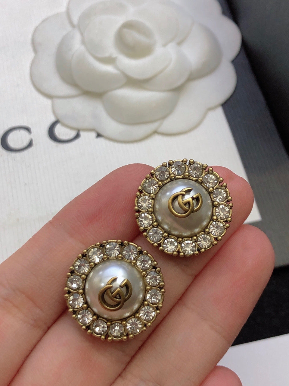 GUCCI 26S DOUBLE G LOGO PEARL CRYSTAL HALO STUD EARRINGS IN AGED GOLD TONE METAL 629031
